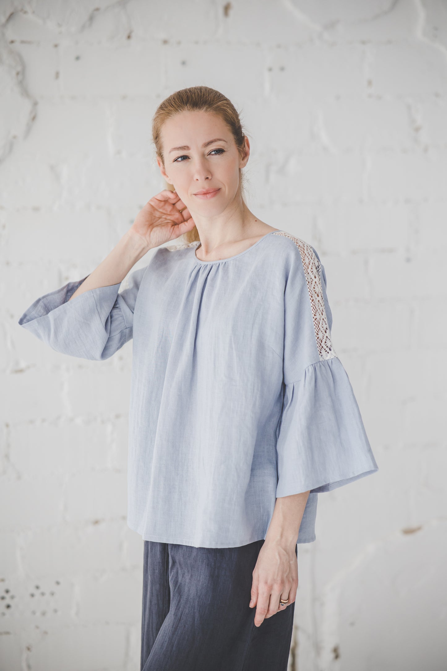 RŪTA linen blouse with crochet lace in Sky blue