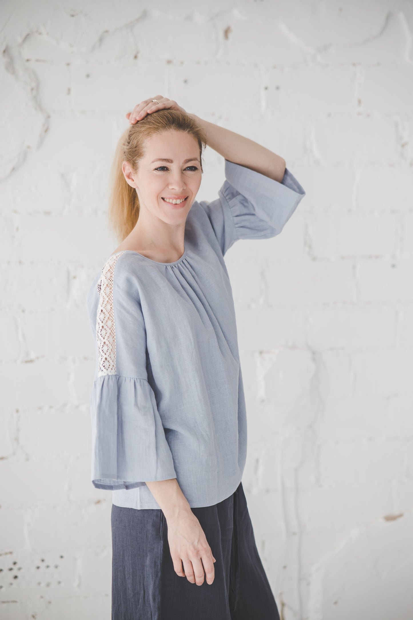 RŪTA linen blouse with crochet lace in Sky blue