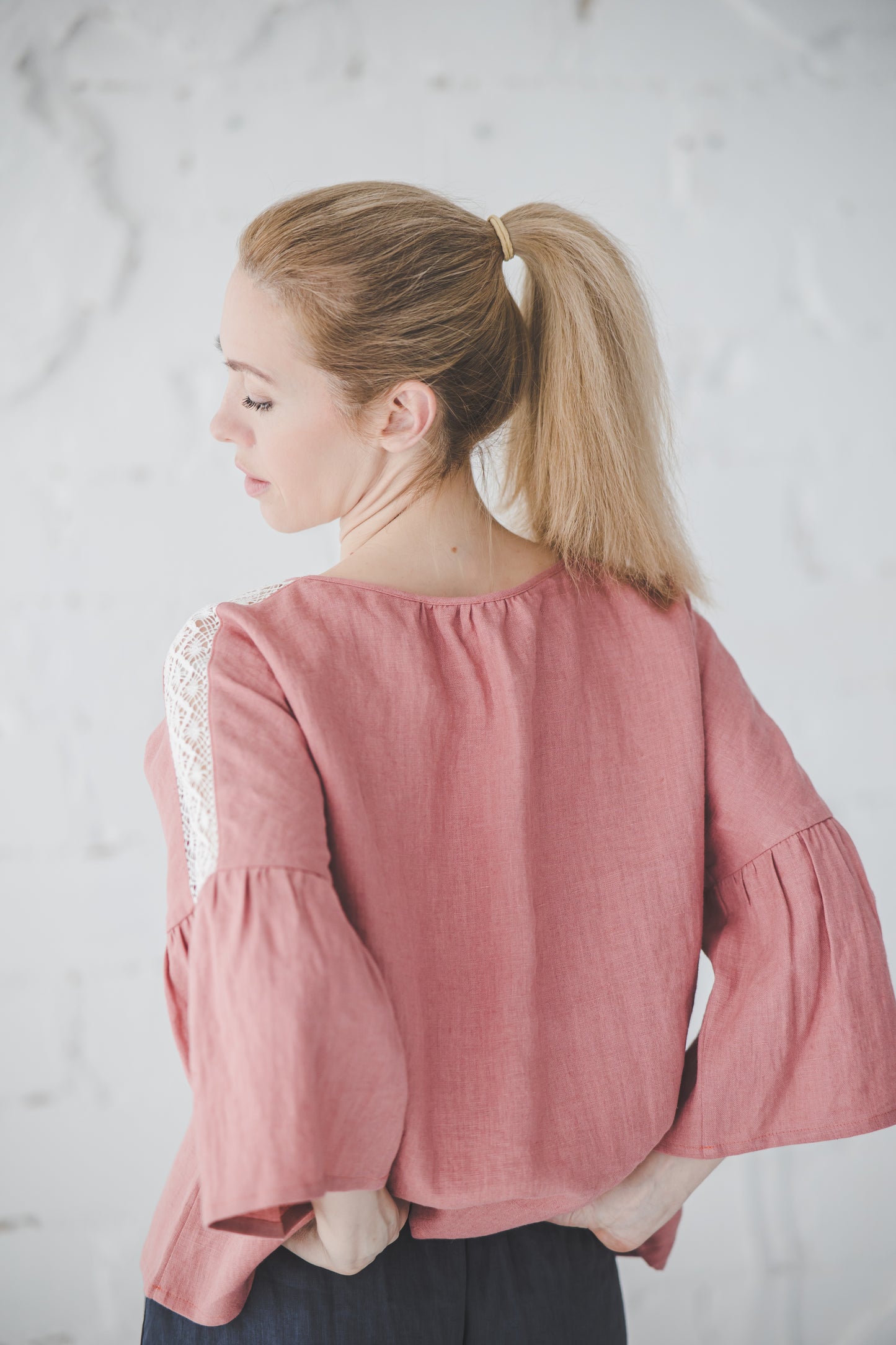 RŪTA linen blouse with crochet lace in Coral