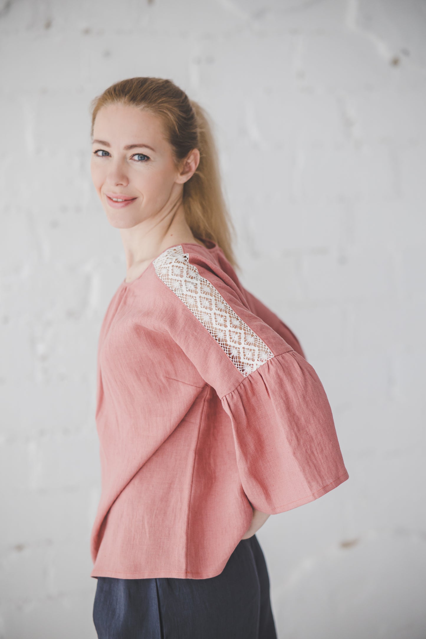 RŪTA linen blouse with crochet lace in Coral