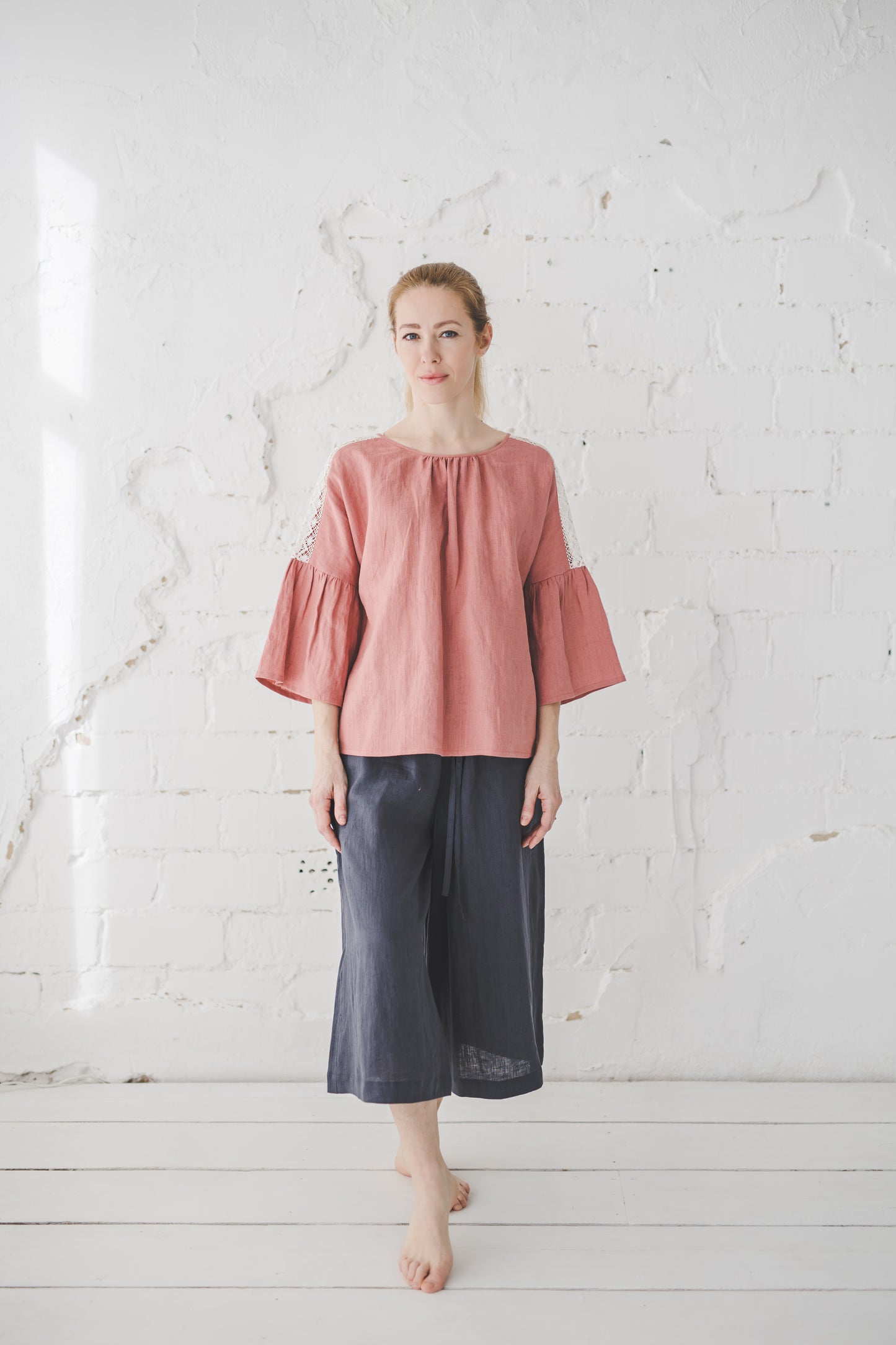 RŪTA linen blouse with crochet lace in Coral