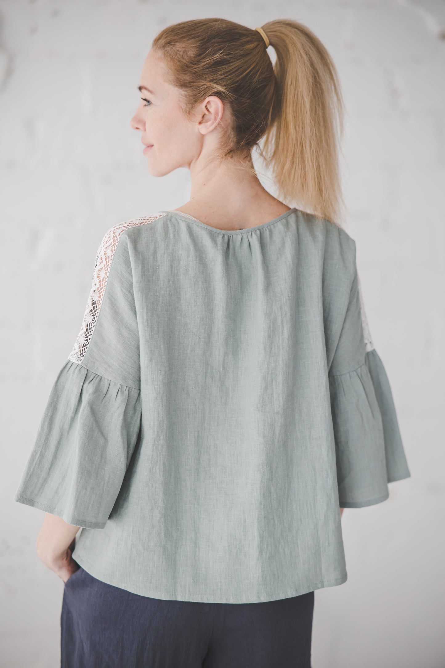 RŪTA linen blouse with crochet lace in Light sage