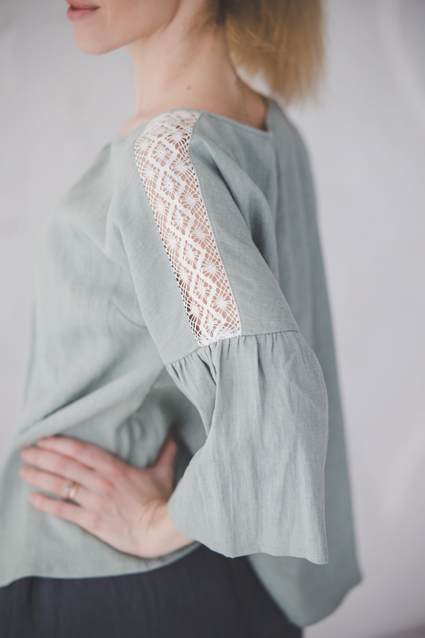 RŪTA linen blouse with crochet lace in Light sage