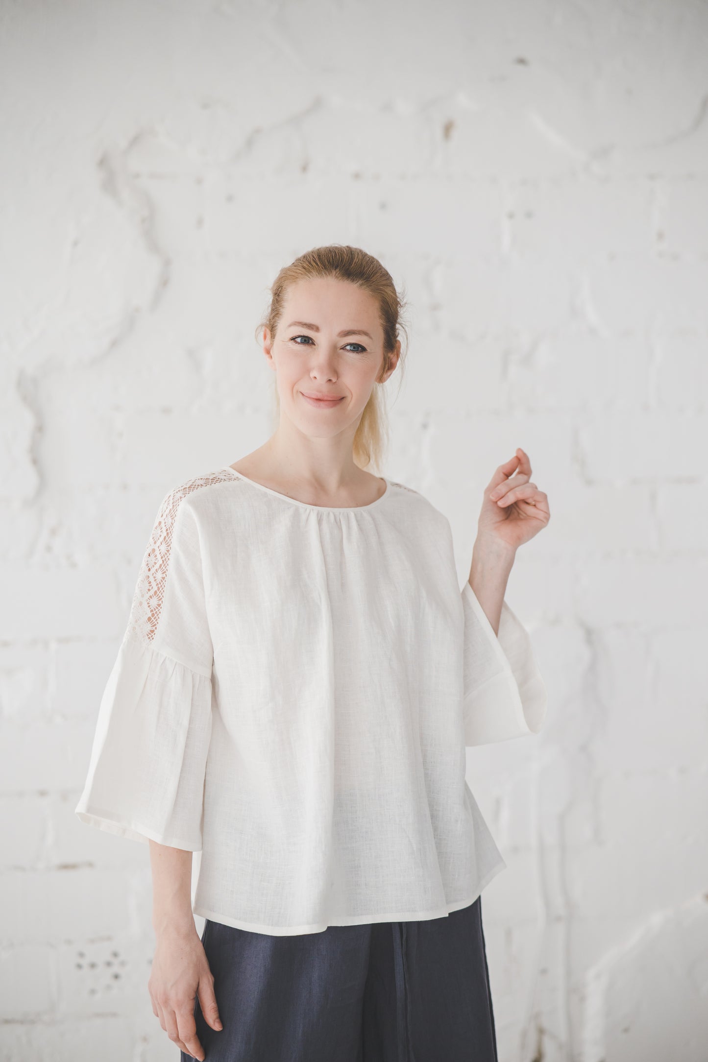 RŪTA linen blouse with crochet lace in Off-white