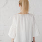 RŪTA linen blouse with crochet lace in Off-white