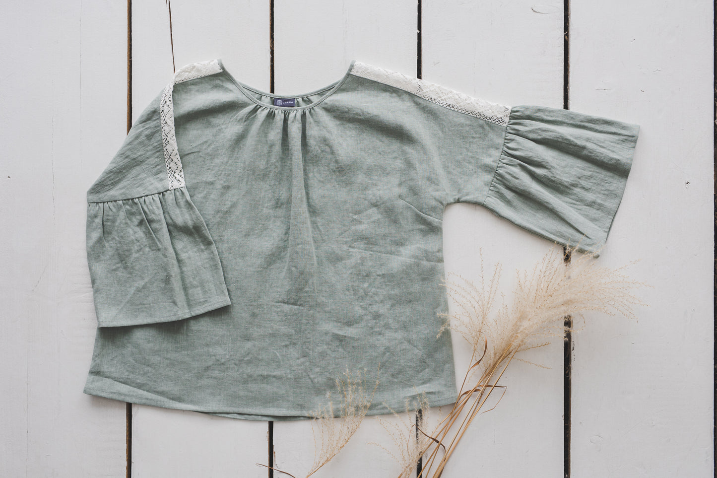 RŪTA linen blouse with crochet lace in Light sage