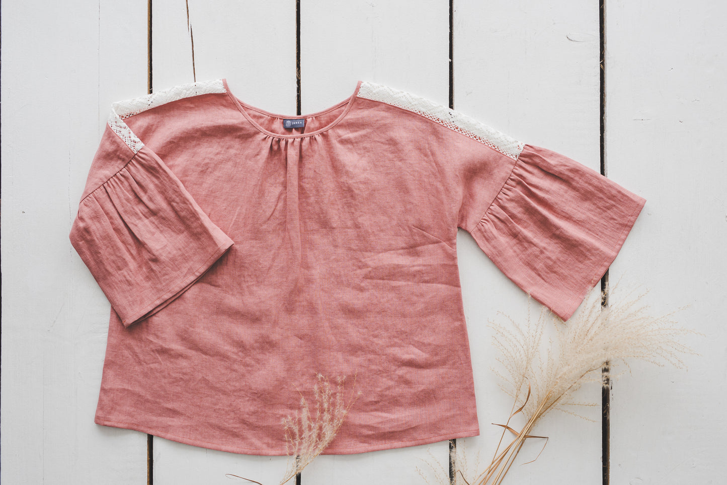 RŪTA linen blouse with crochet lace in Coral