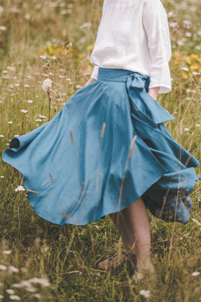 Teal blue green ocean color linen skirt is very wide, flowy and flattering 