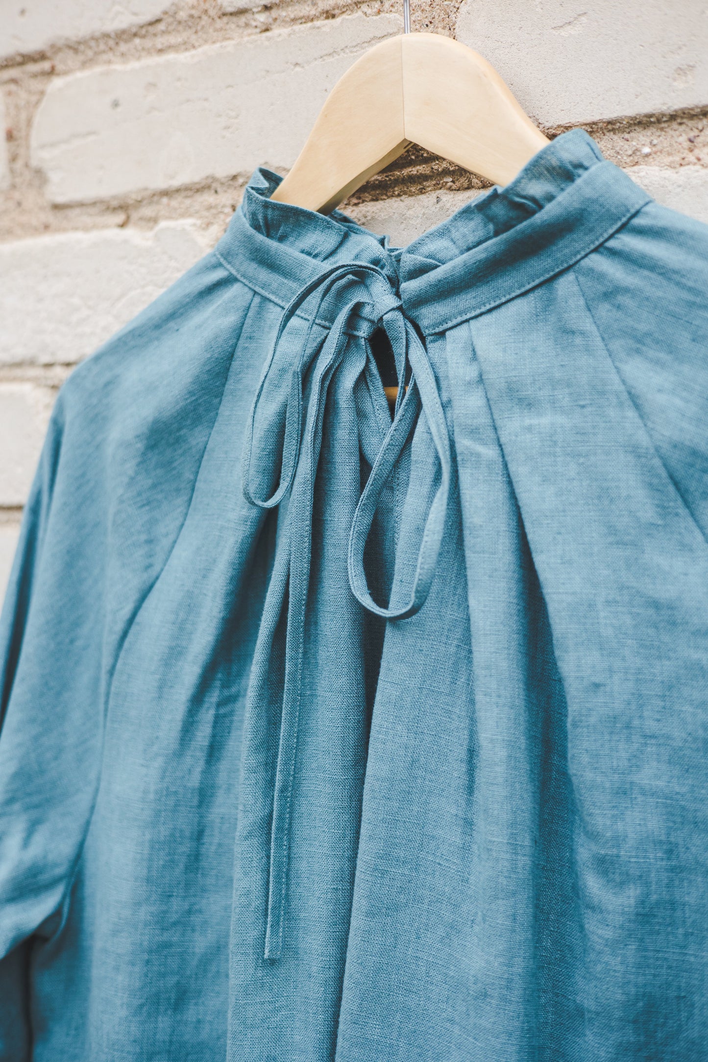 META linen blouse with puffy sleeves & frills in Teal color