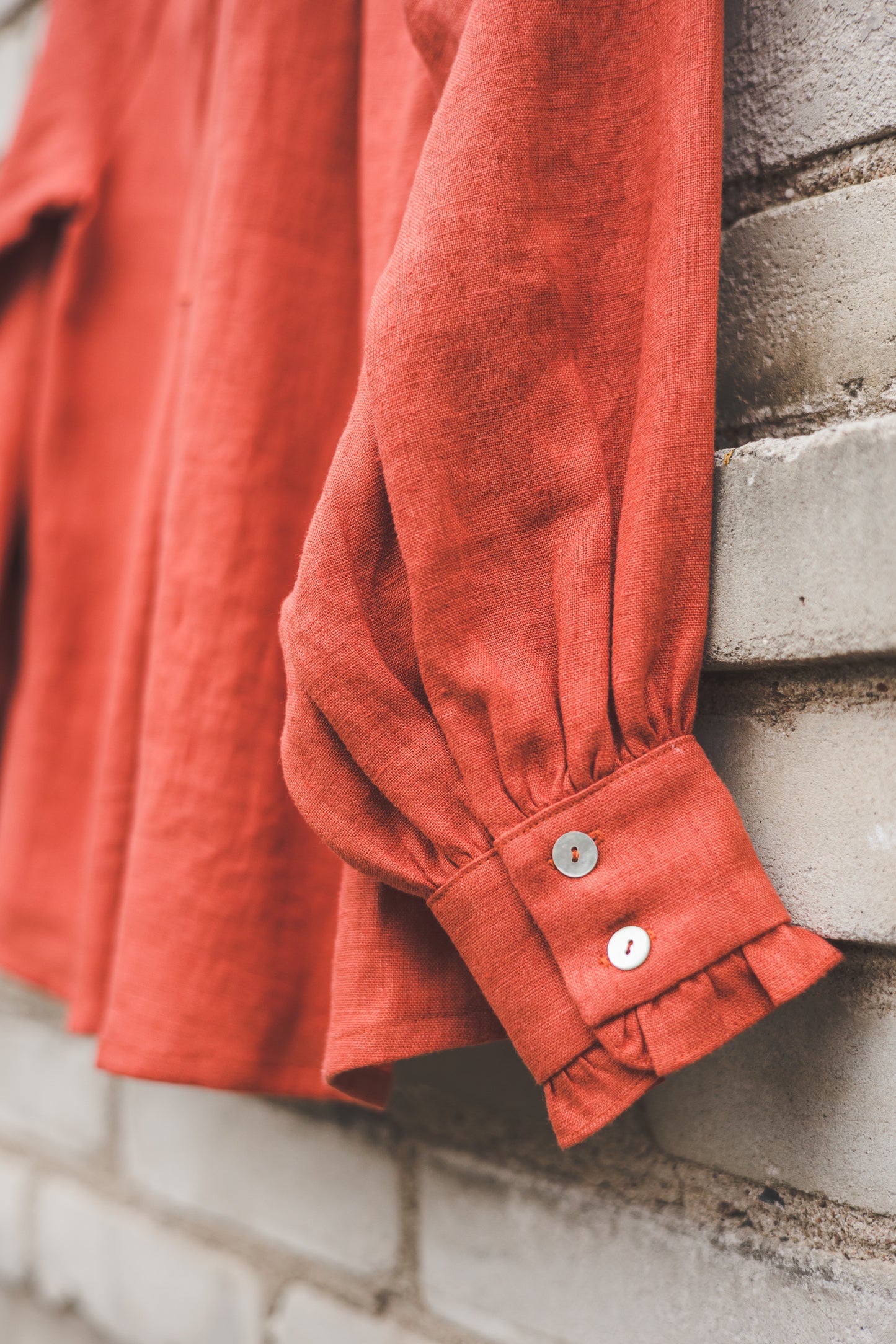 META linen blouse with puffy sleeves & frills in Orange