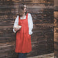 Crossback Pinafore apron with pockets in Orange