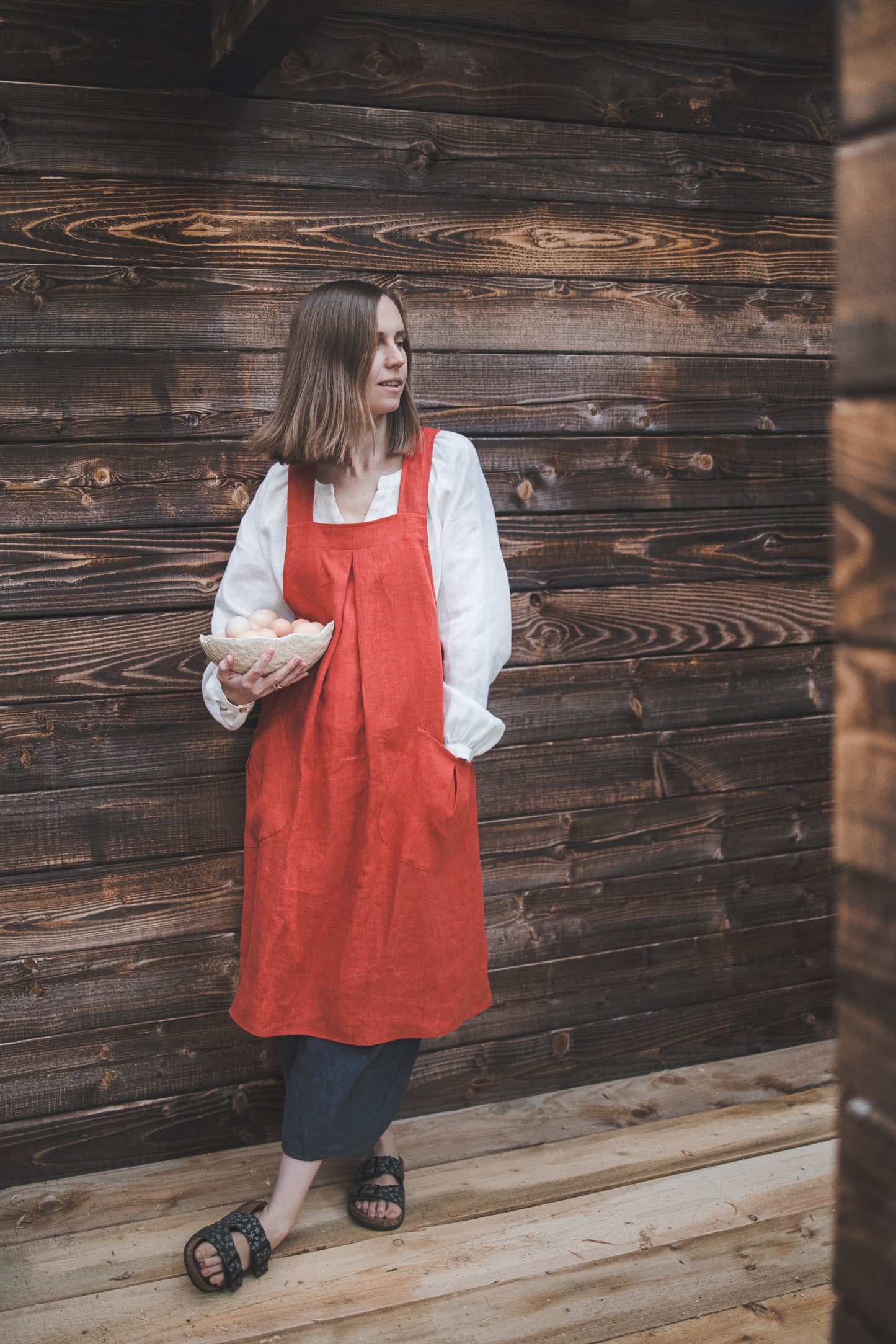 Crossback Pinafore apron with pockets in Orange