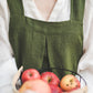 Crossback Pinafore apron with pockets in Forest green