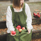 Crossback Pinafore apron with pockets in Forest green