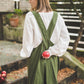 Crossback Pinafore apron with pockets in Forest green