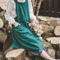 Crossback Pinafore apron with pockets in Emerald green