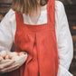 Crossback Pinafore apron with pockets in Orange