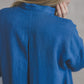Backside with a slit fold and band collar neckline