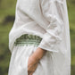 Comfy side seam pockets and ruffled elastic waisline