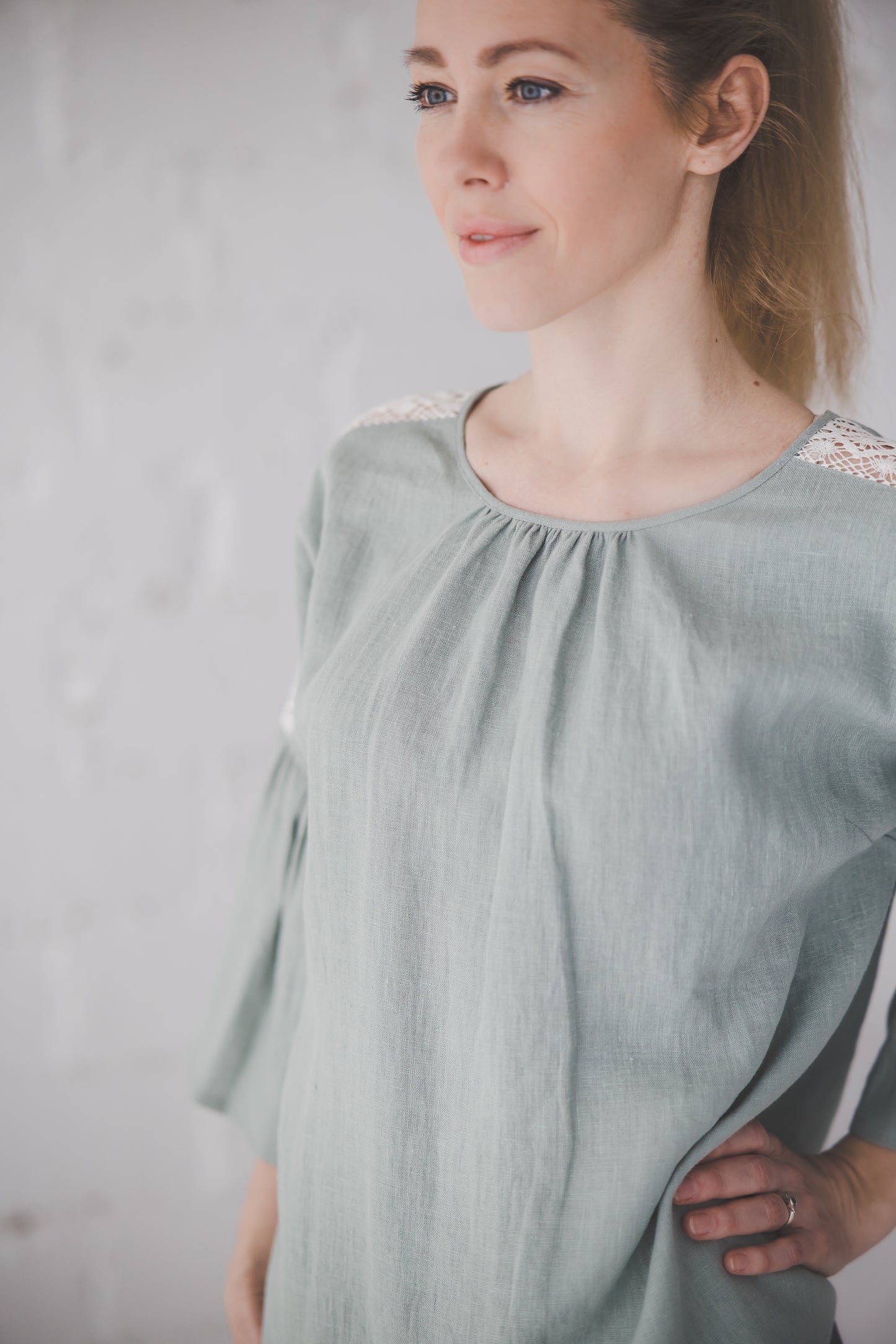 RŪTA midi linen dress with crochet lace in Light sage color