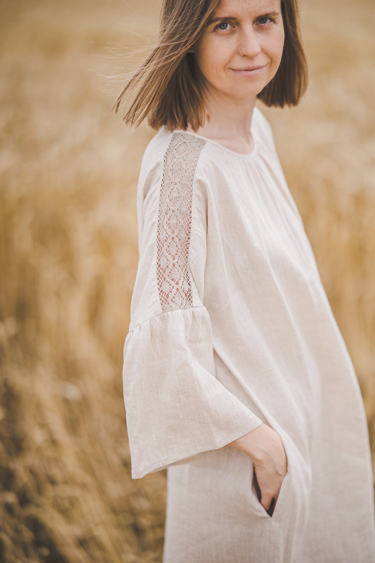 RŪTA midi linen dress with crochet lace in Light sage color