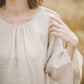 RŪTA midi linen dress with crochet lace in Natural linen color