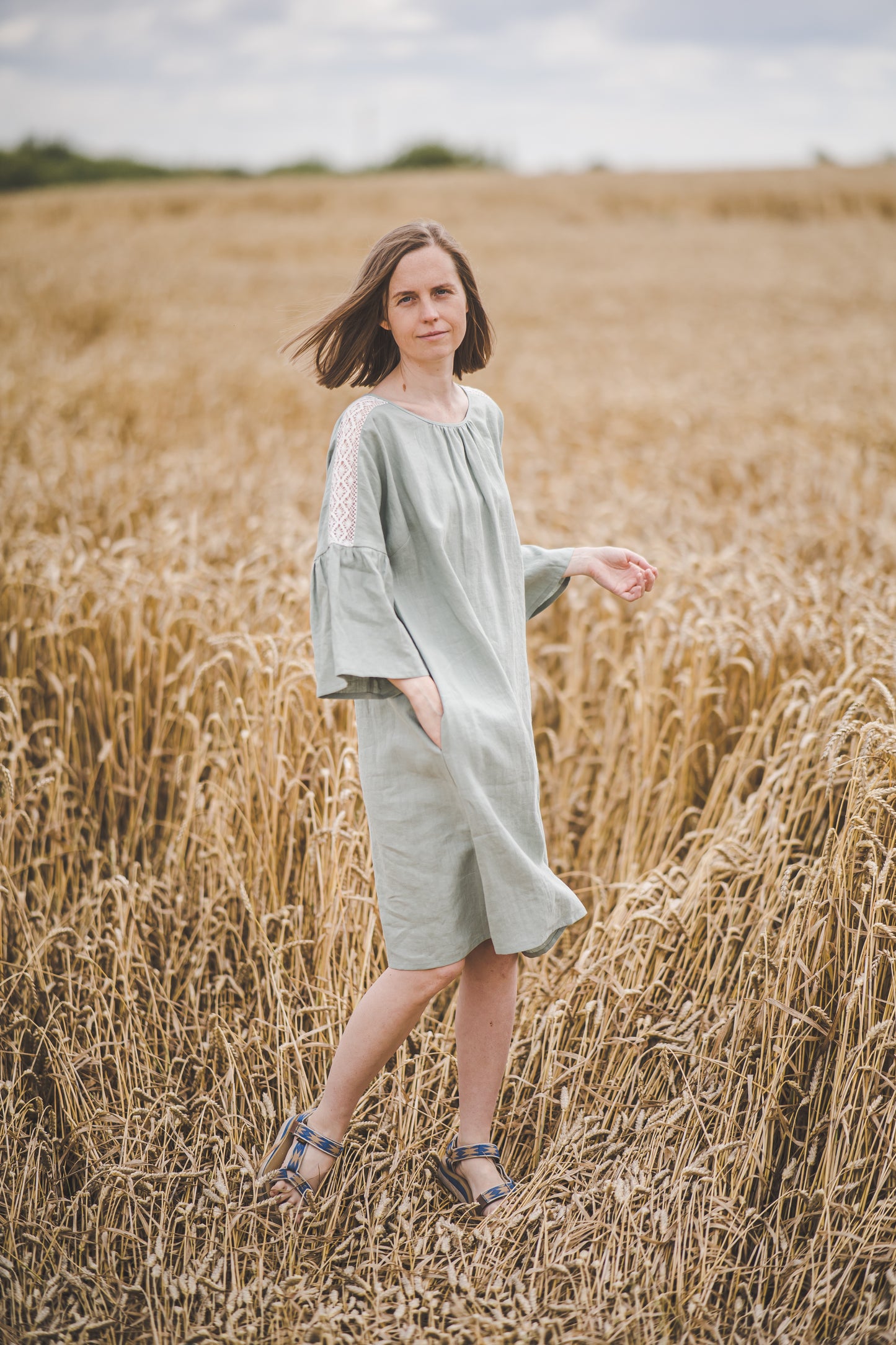 RŪTA midi linen dress with crochet lace in Light sage color