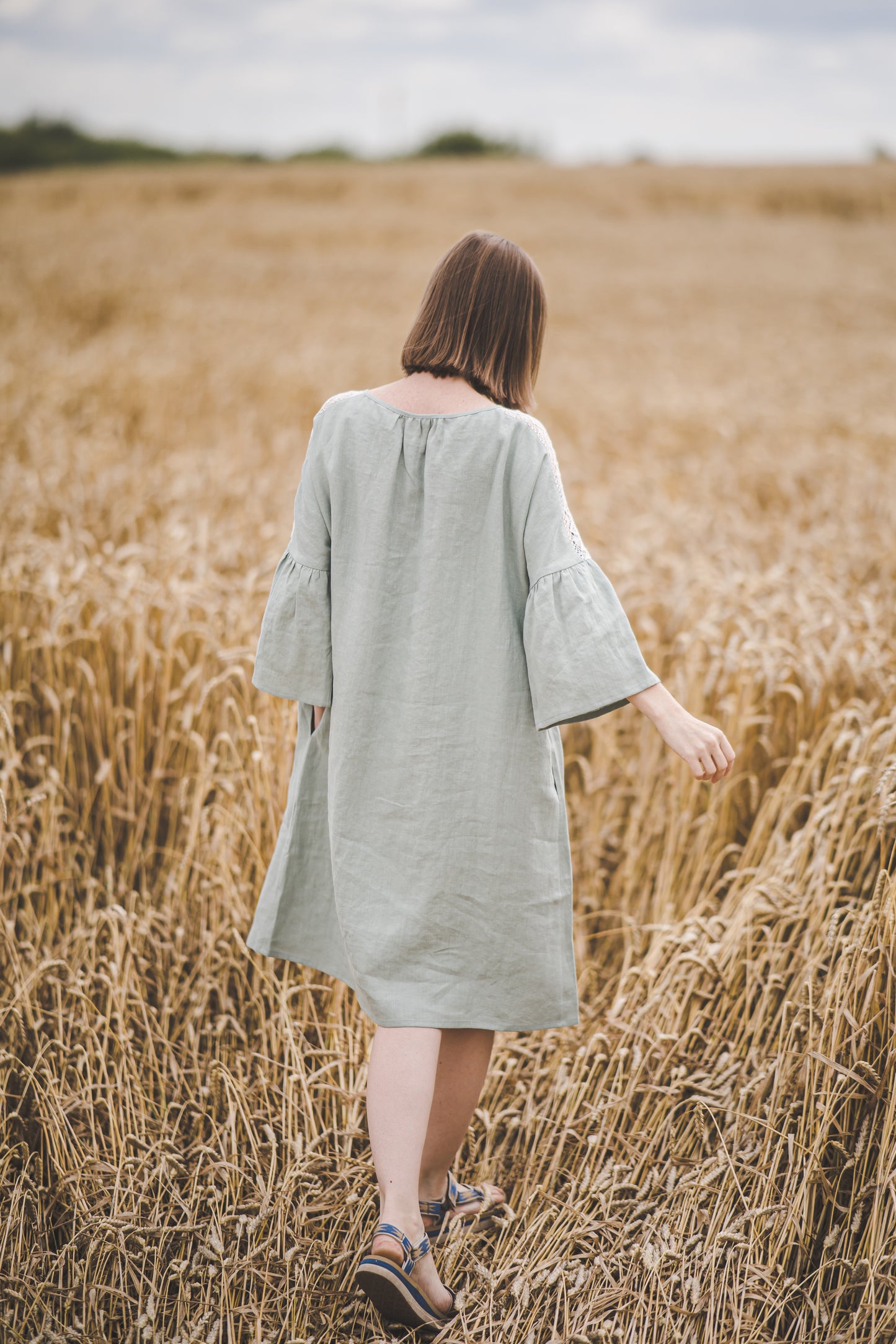 RŪTA midi linen dress with crochet lace in Light sage color