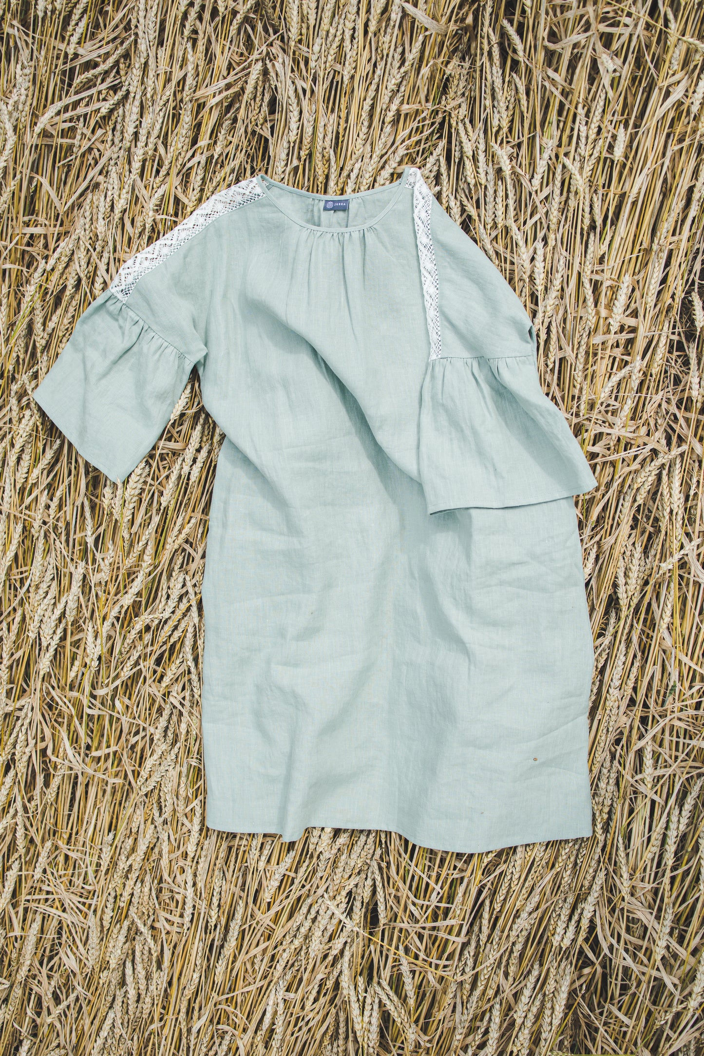 RŪTA midi linen dress with crochet lace in Light sage color