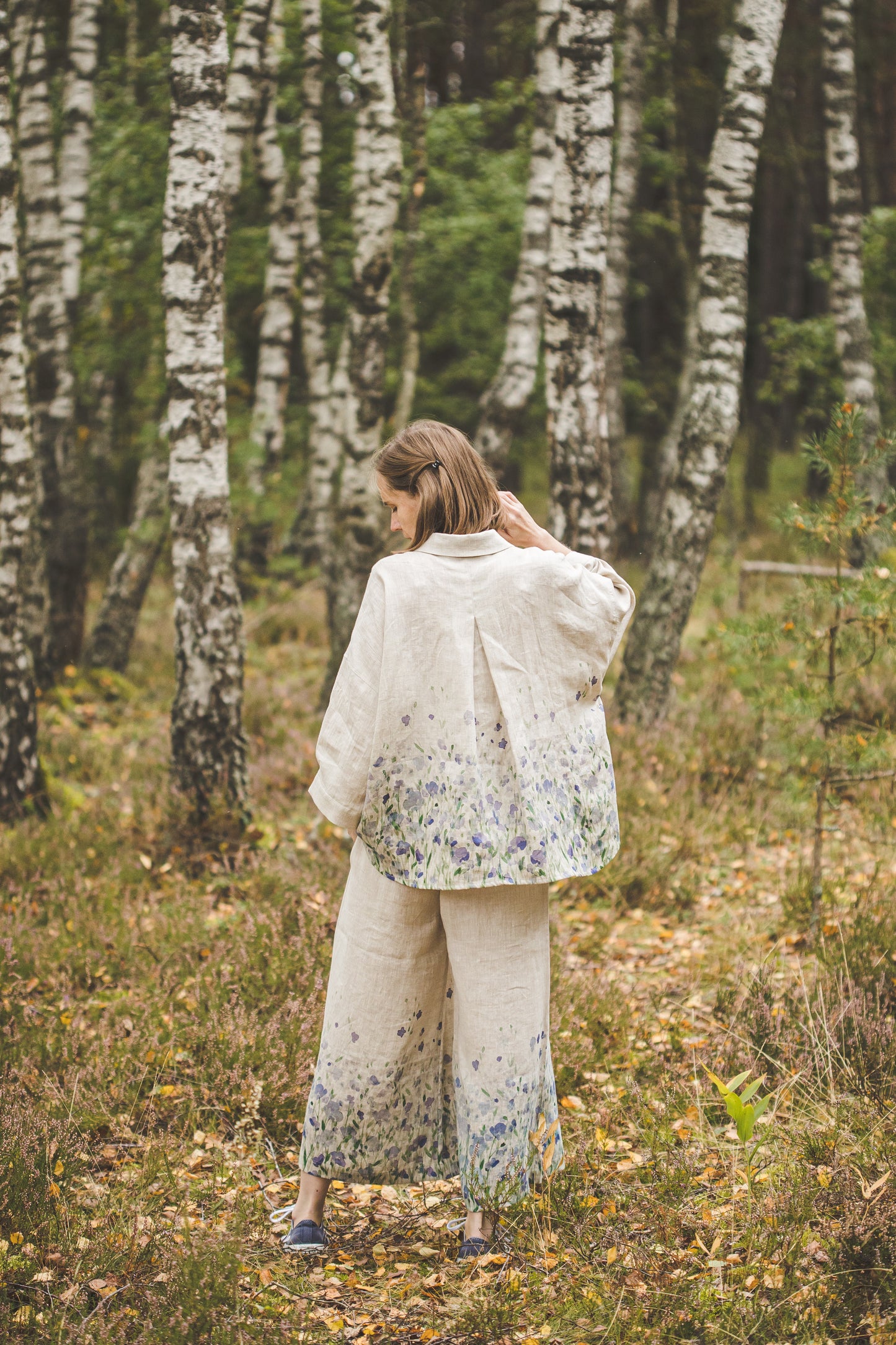 Oversized wide cropped linen shirt with floral meadow print. Comfy cropped palazzo pants with pockets.