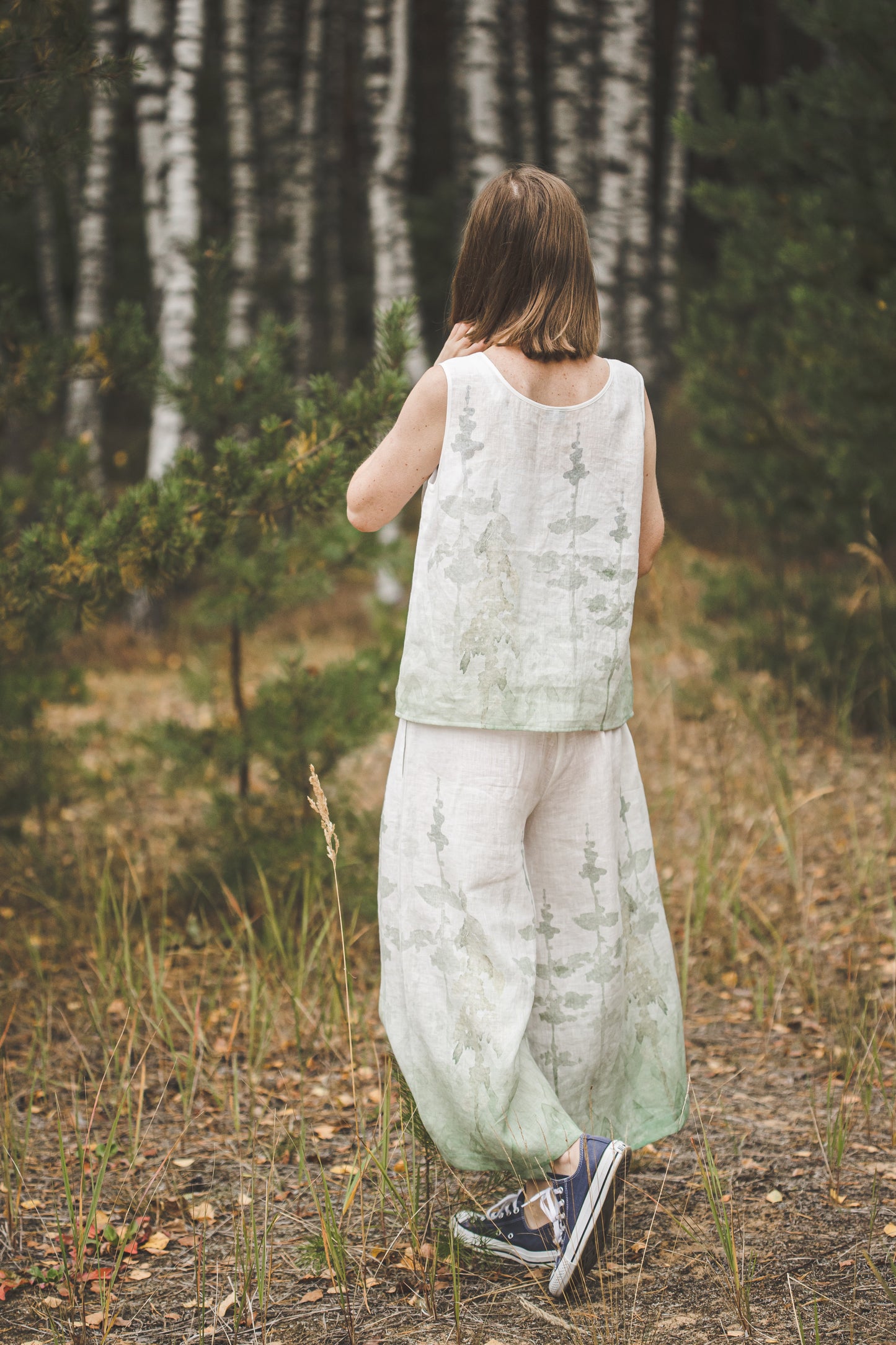 Sleeveless linen tank top with wide leg linen culottes pants.