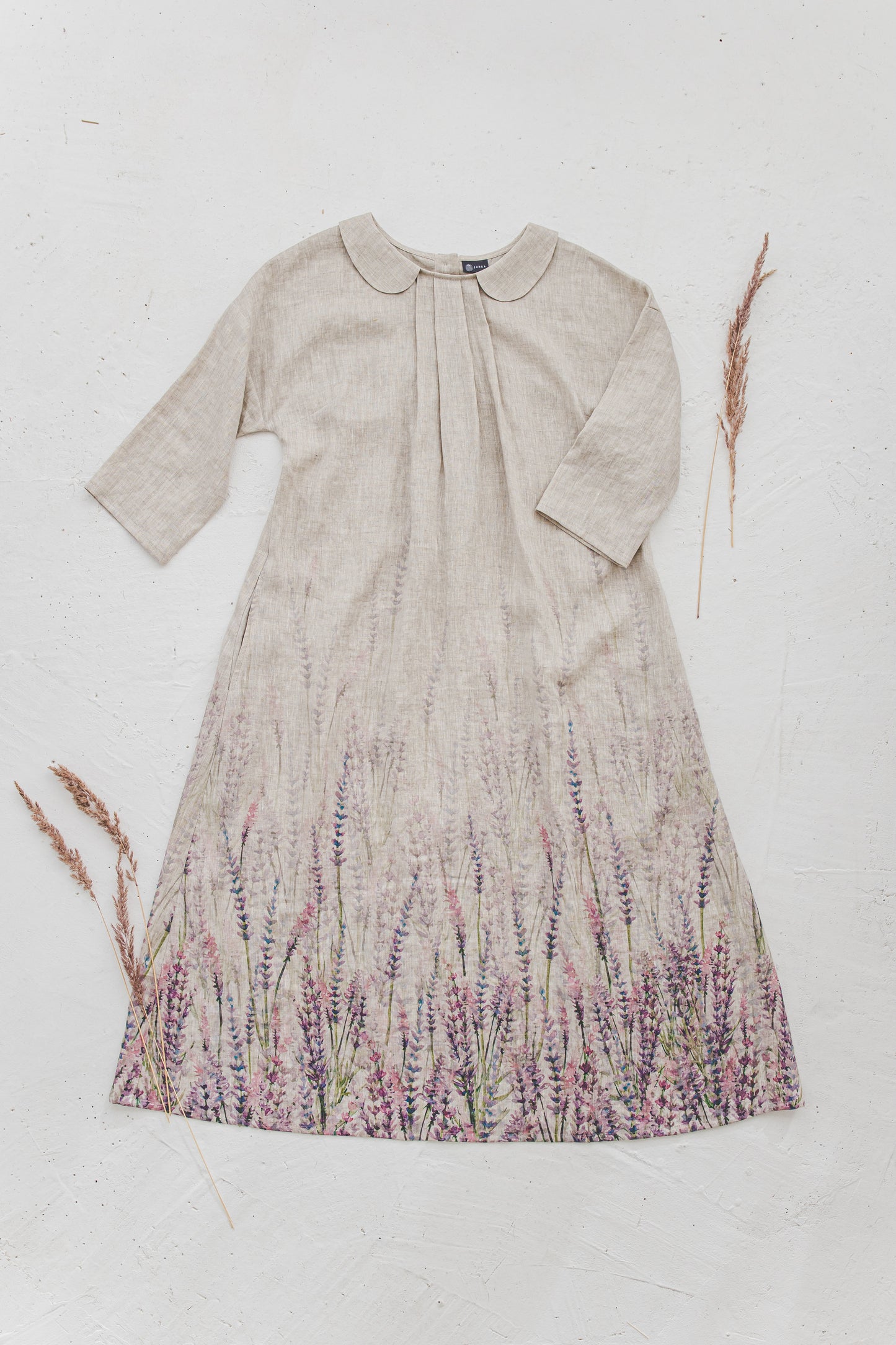 Collared plus size linen dres with Lavender print lying flat